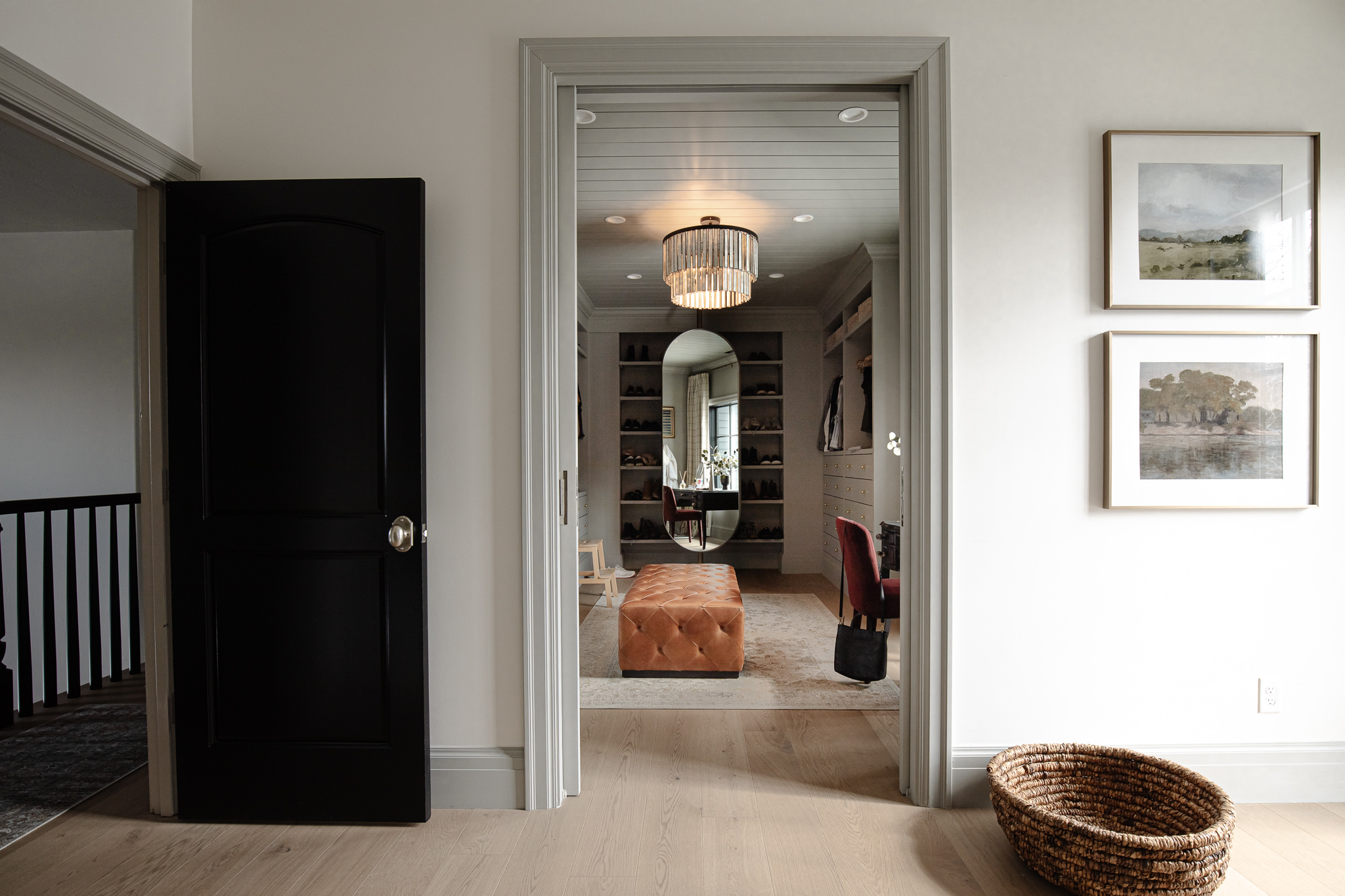 A real painted interior door with a highly reflective finish, showing crisp trim lines and sunlight reflecting off the surface